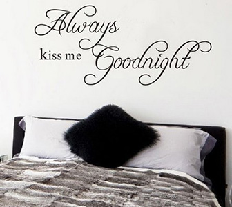 Kiss Me goodnight sticker above bed